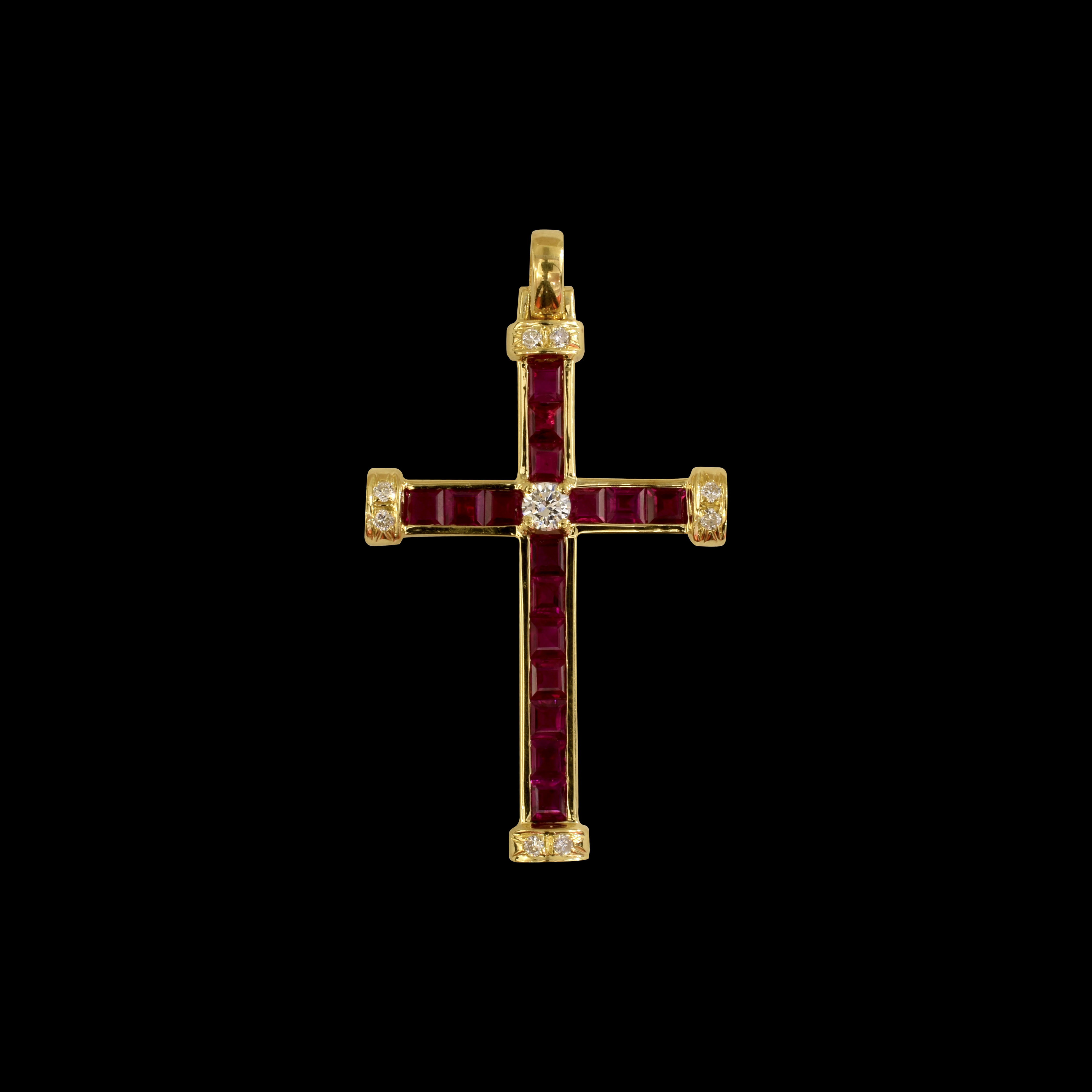 - A Ruby and Diamond Cross set in 18k Gold