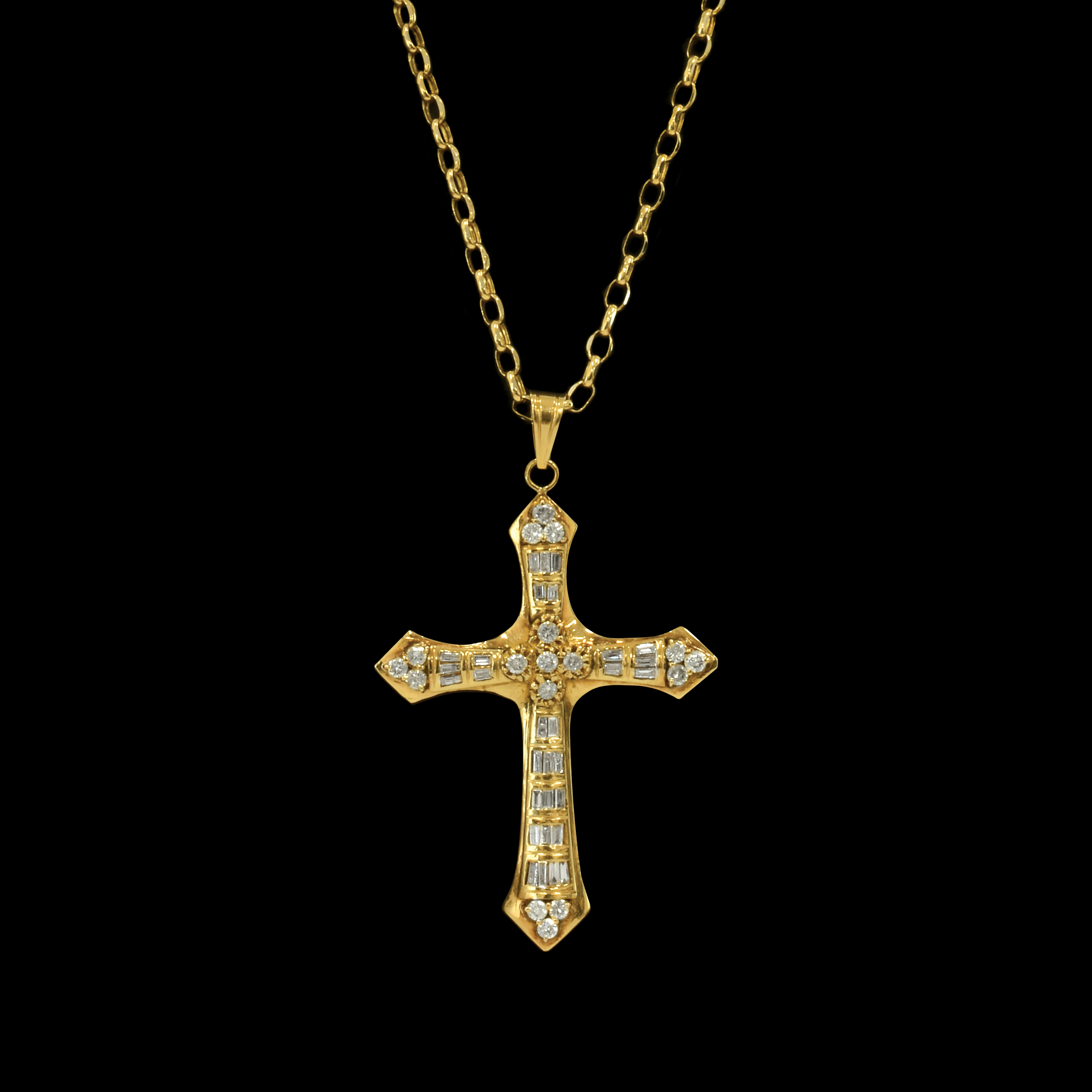 - A 2.07 tcw diamond Crucifix set in 14k yellow gold