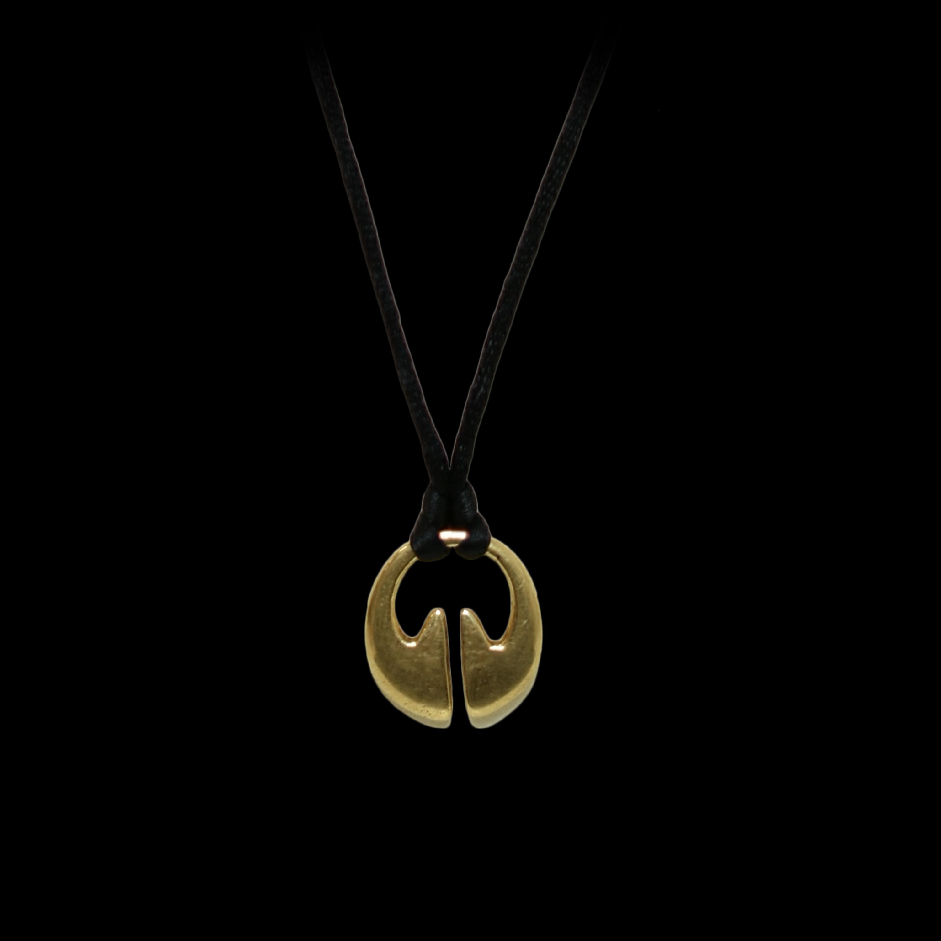 Ling Ling O - A 14k yellow gold pendant