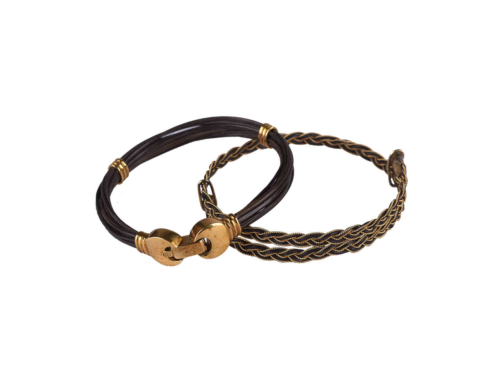 A pair of African bracelets with gold details